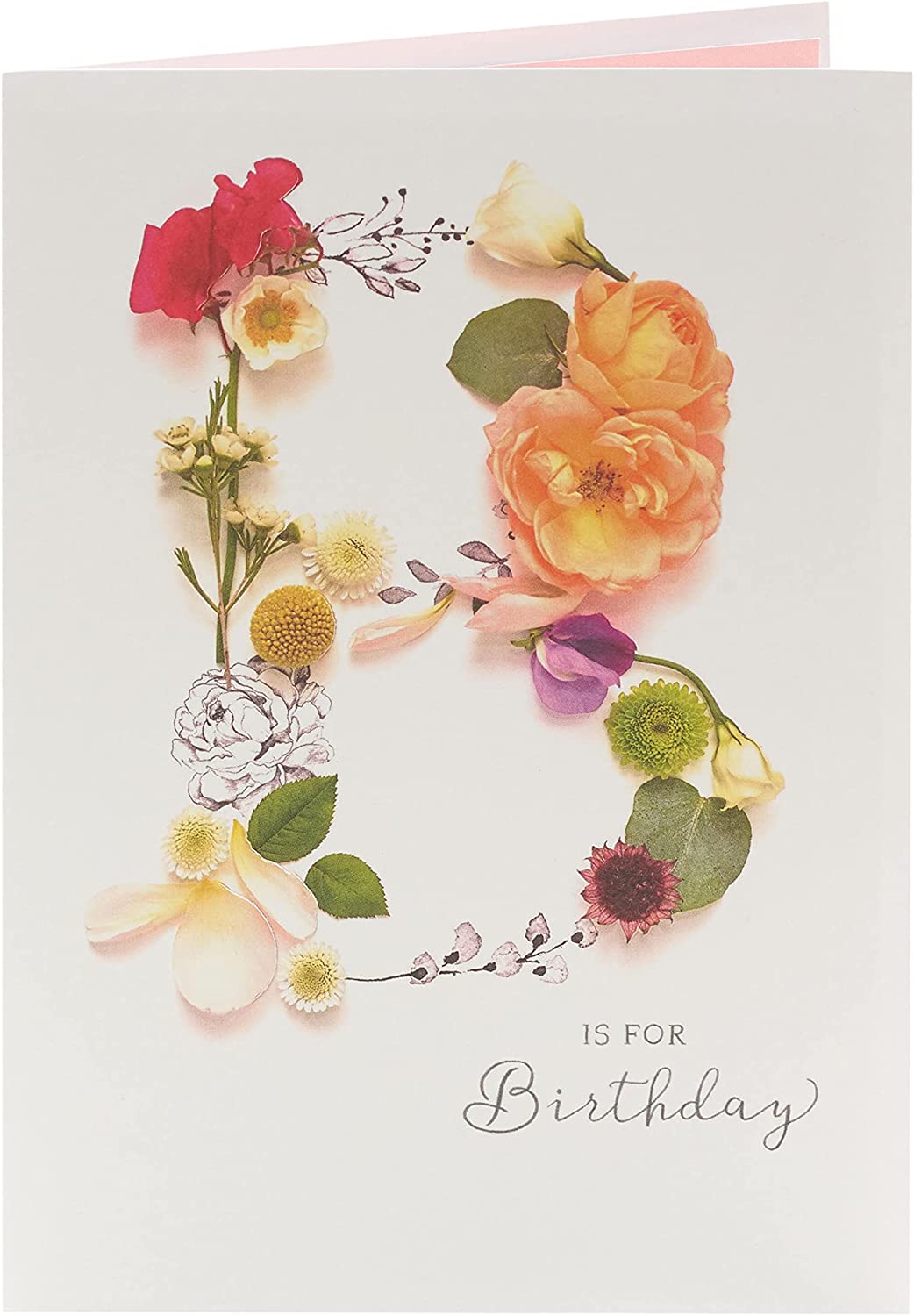 UK Greetings Into the Meadow female birthday card featuring floral and nature-themed illustrations on stationery.