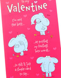 UK Greetings Valentine's Day card featuring an elephant design for him, her, or partner, with colorful and festive artwork.