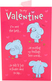 UK Greetings Valentine's Day card for him, her, or partner featuring a charming elephant design and romantic message.