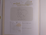 Widdop & Co Disney Dumbo baby memory book keepsake for first year, featuring Dumbo illustration and space for baby's special moments.